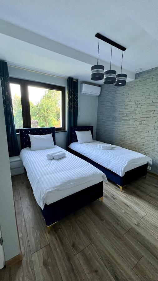 Aparthotel W Dolinie Stawow Zator By Housine Las Extérieur photo