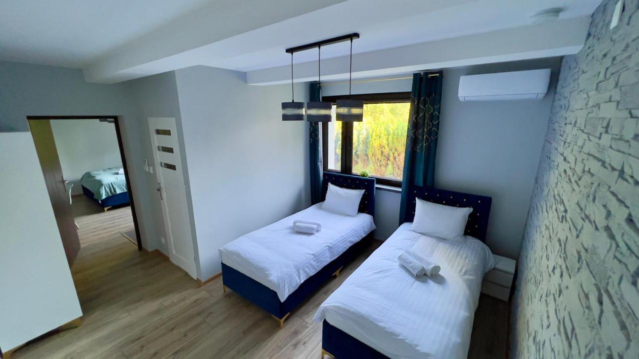 Aparthotel W Dolinie Stawow Zator By Housine Las Extérieur photo